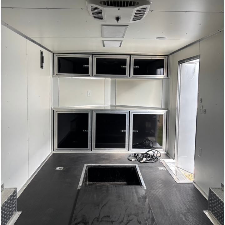 18ft Enclosed Trailer Custom, 8.5 x 18 Black with Chrome ATP with Coin Flooring, Finished Interior, Overhead Cabinet, A/C and Heat strip, and Aluminum Mags