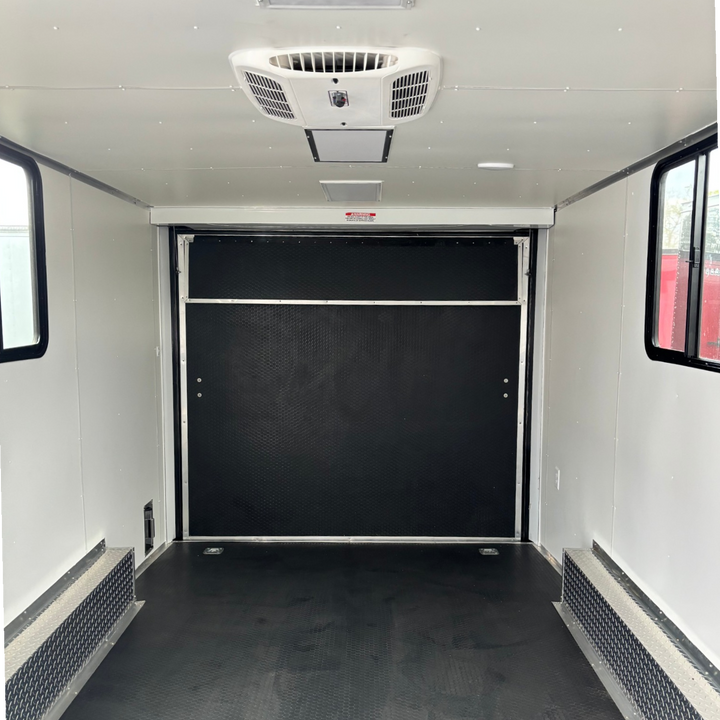 18ft Enclosed Trailer Custom, 8.5 x 18 Black with Chrome ATP with Coin Flooring, Finished Interior, Overhead Cabinet, A/C and Heat strip, and Aluminum Mags